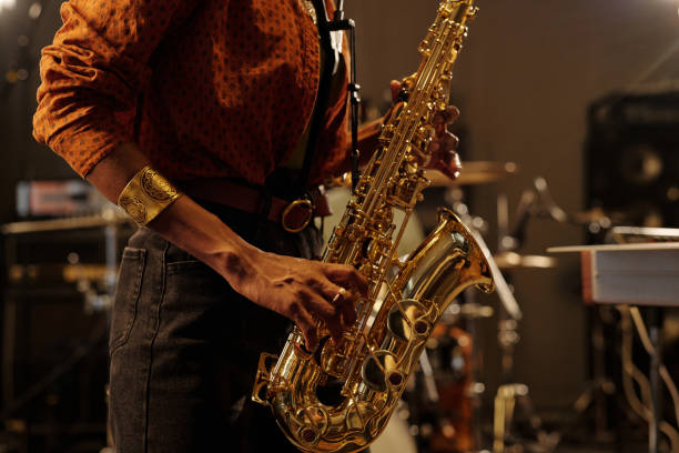 istock Playing Saxophone in Music Studio with Passion 2166312135