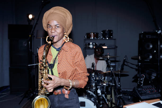 istock Playing Saxophone During Rehearsal in Music Studio 2166312139