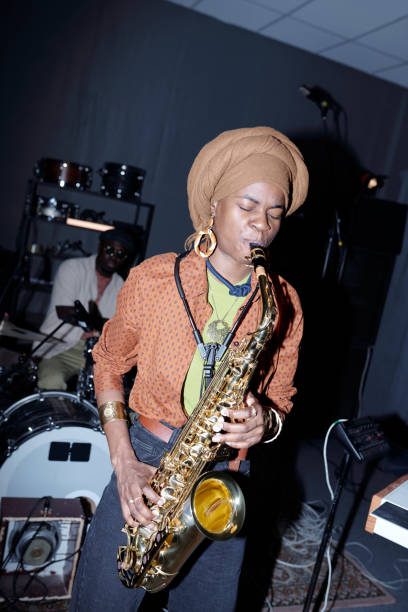 istock Performing Musician Playing Saxophone at Indoor Venue 2166312144