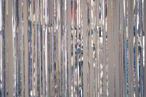 istock Silver fringe curtains party decoration with copy space. Metallic tinsel glitter rain background. Concept of Christmas, party, wedding, birthday, event 2166315863