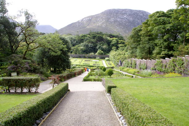 istock A walking path into a nice garden, in Kylemore, in Connemara, in Ireland 2166316437