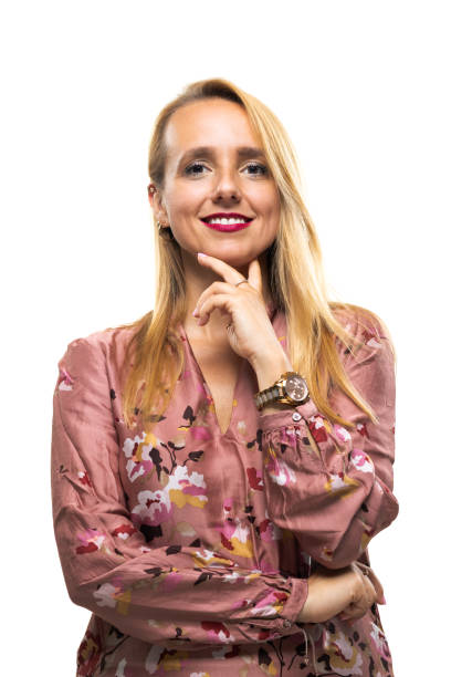 istock Confident businesswoman in floral blouse with thoughtful expression 2166320428