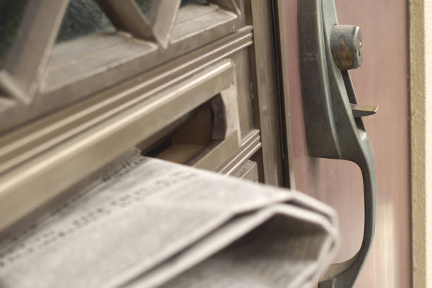 istock An entrance and a newspaper in the mailbox 2166324654