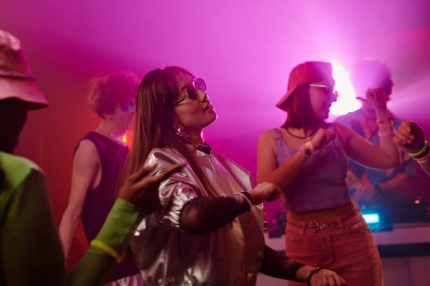 istock Dancing among friends in night club 2166328505