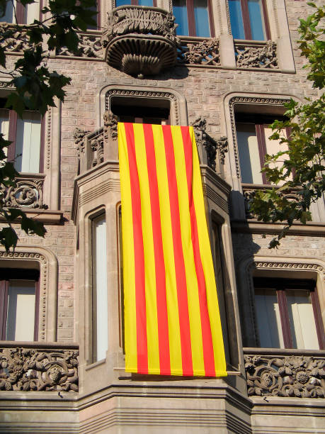 Catalan flag hanging on a building in Barcelona, Spain