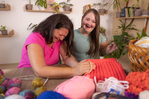 istock Mom and Daughter Crafting 2166331842