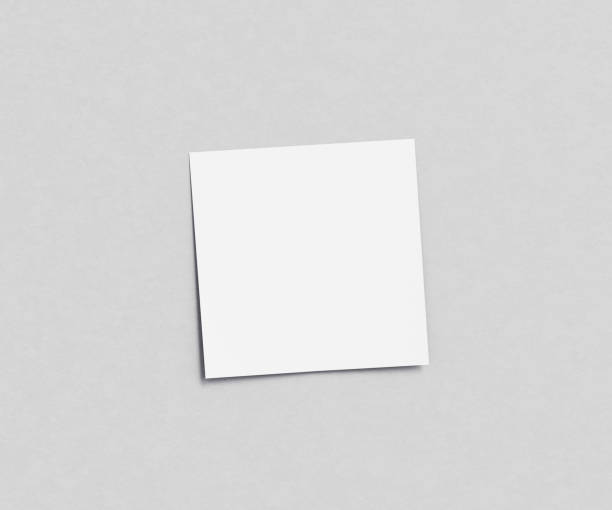 istock white sticky note on gray wall stock photo 2166333152