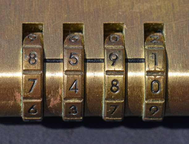 istock Brass barrel of a numerical combination padlock. Close up 2166334907