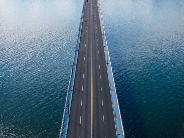 istock view of highway over lake 2166338407