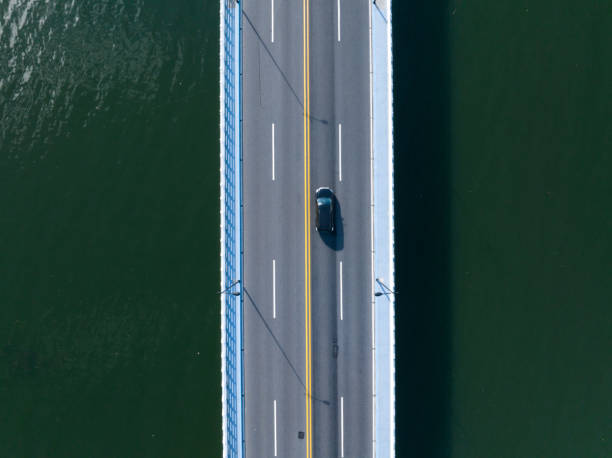 istock view of highway over lake 2166338461