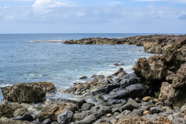 istock Oahu Rocky Coastline with Cliff and Horizon 2166348780