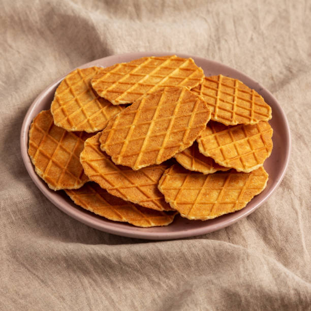istock Homemade Waffle Crisps on a Plate, side view. 2166349123