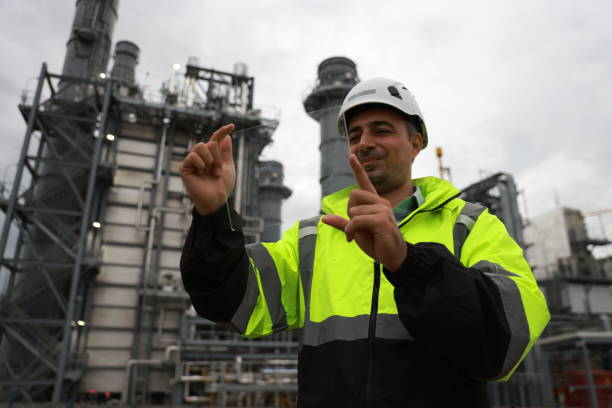 istock A system technical specialist displays a portable glass device or transparent screen with ample copy space at the thermal power plant. 2166360084
