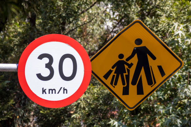 Double signage, school advance and max speed 30 warning reflective sign. Sao Paulo, Brazil