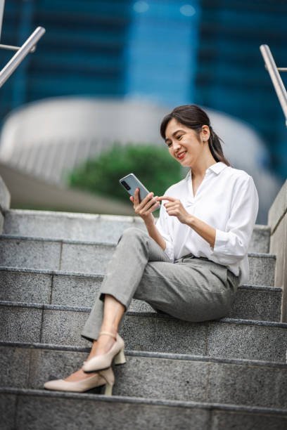 istock Leading with a Smile: The Intersection of Technology and Success in the Financial District 2166362947