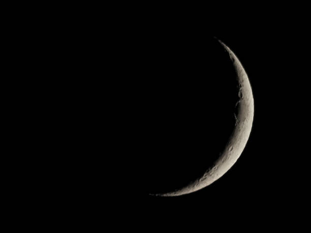 istock Waxing crescent moon seen with telescope 2166368115