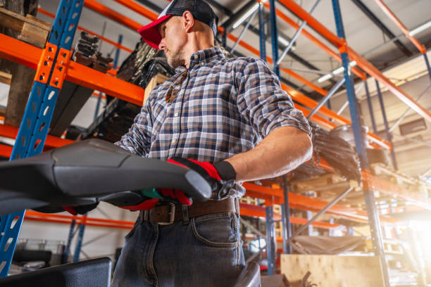 istock Warehouse Worker Organizing Equipment in a Storage Facility During Daylight Hours 2166369073