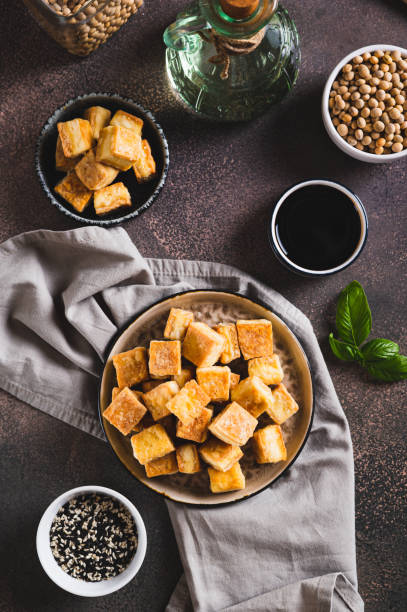 istock Japanese fried soybean tofu cheese on plate on table top and vertical view 2166369267
