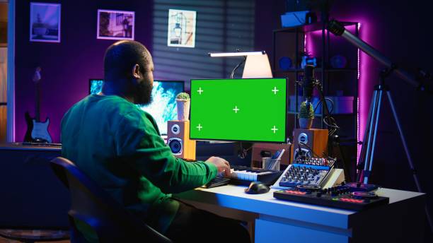 istock Songwriter operates on synthesizer piano keys next to isolated display 2166371888