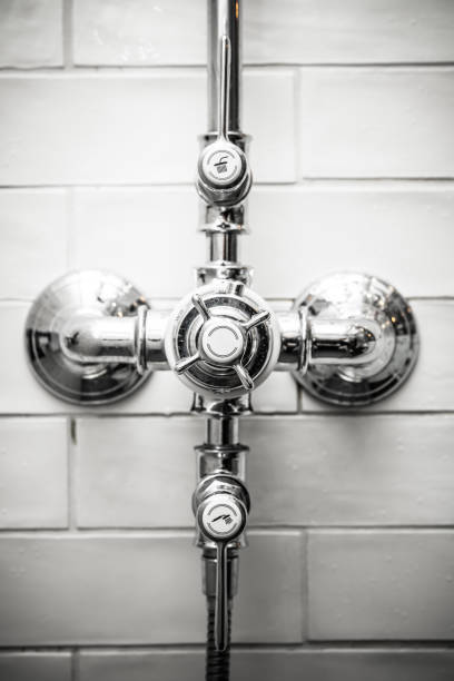istock Modern Chrome Shower Controls Assembly with Monochrome Subway Tiles Background for Contemporary Bathroom Design 2166372127