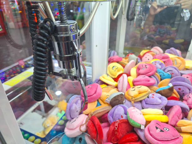 istock A claw crane machine game or UFO catcher. 2166383738