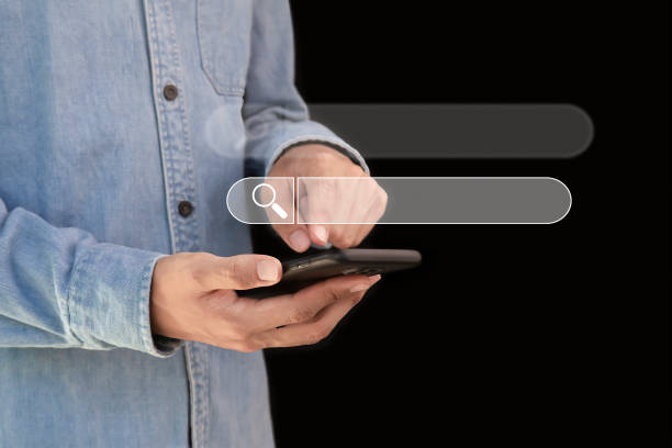 istock Searching the internet with a search bar working on a smartphone, internet network concept. 2166387578