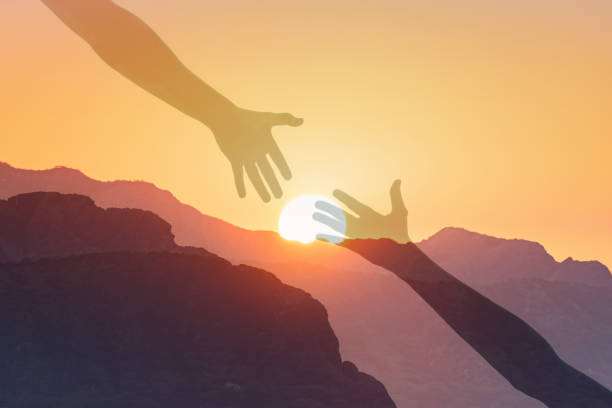 istock Lending a helping hand, teamwork friendship and support concept. 2166389805