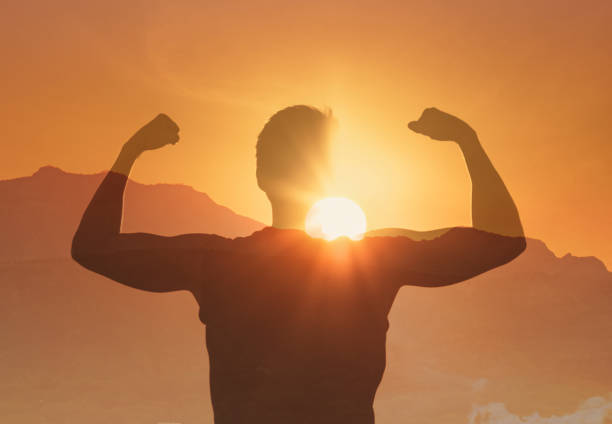istock Strong fit man flexing showing physical and mental strength. 2166389859