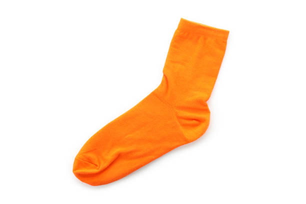 Bright orange sock isolated on white background