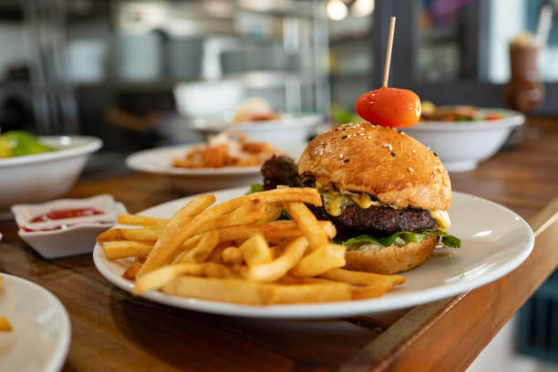 istock Burger served on the table at a restaurant 2166394298