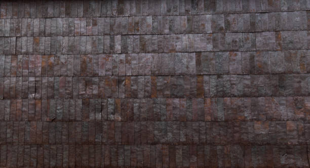 istock Worn Metal Tiles with Rust
Rust-Stained Dark Metal Plates 2166395974