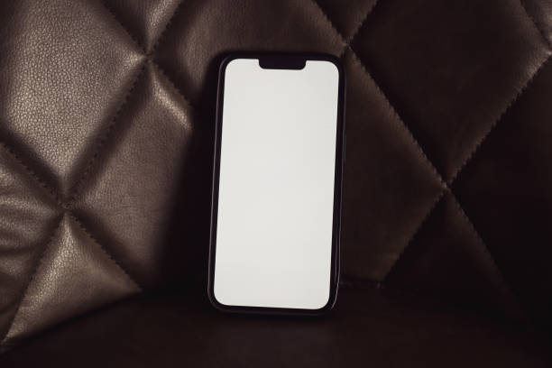 istock Smartphone mockup screen on leather chair 2166403971