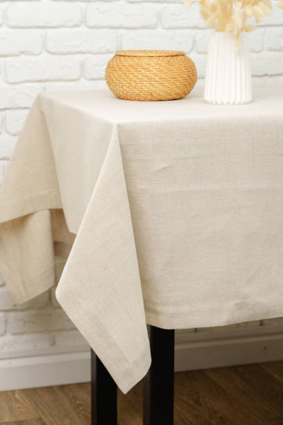 istock White Brick Wall With Beige Tablecloth and Basket 2166407703
