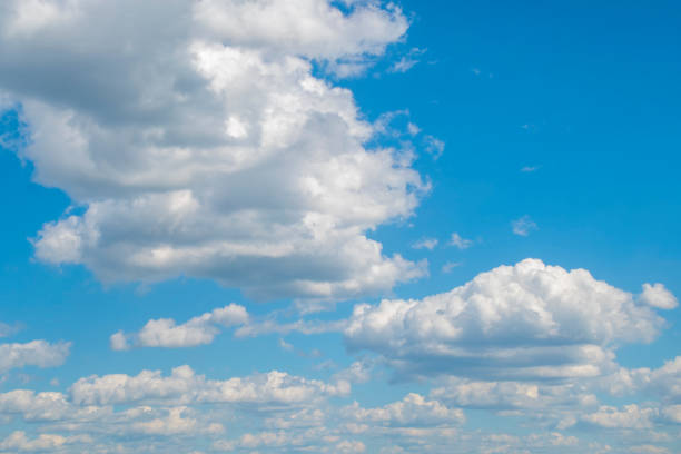 istock Background with cumulus clouds in summer. Panorama with light blue sky with white clouds. 2166407872