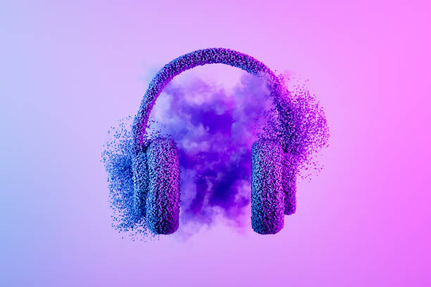 Headphones with particles on neon lighting purple background, minimal music concept stock photo