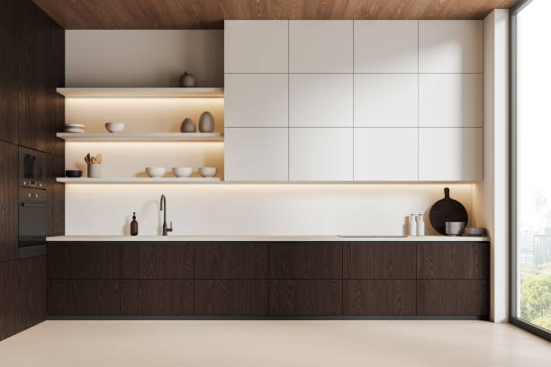 istock Stylish home kitchen interior with cooking cabinet and panoramic window 2166413275