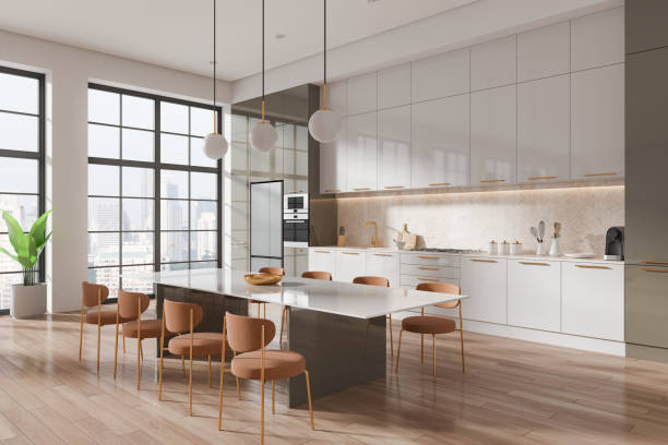 istock Modern kitchen interior with wooden flooring and brown chairs, large windows with city view, contemporary style, bright daylight setting, concept of urban living.  3D Rendering 2166413721