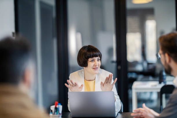 istock A businesswoman is explaining business strategy at boardroom. 2166416919