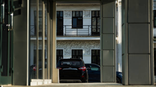 istock Office building, framing, diagonal, car in the distance 2166419981