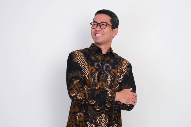 istock A man standing confident with arms crossed showing happy face 2166423856