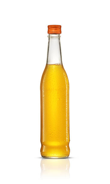 glass bottle with syrup for drinks on white background