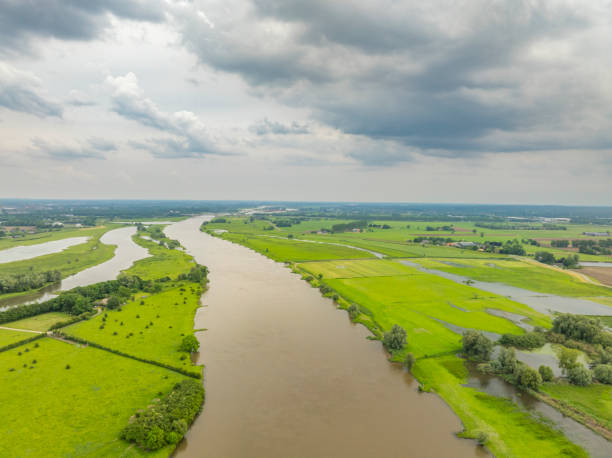 istock IJssel river springtime landscape with a dark sky above 2166427631