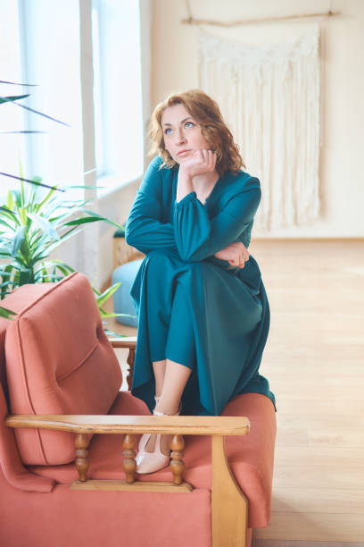 istock a middle-aged woman in retro clothes 2166431361