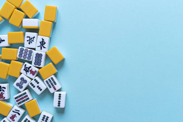istock Mahjong tiles lined up 2166432620