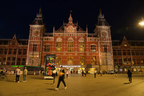 Shot was taken in front of the Amsterdam Centraal station around midnight. Lot less busy than day time and showcasing primarily of worker’s and local bystanders heading home. Long exposure shot.