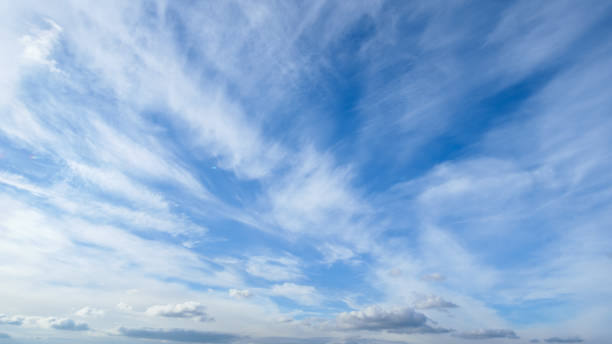 istock beautiful blue color sky and soft white clouds for abstract background 2166438306