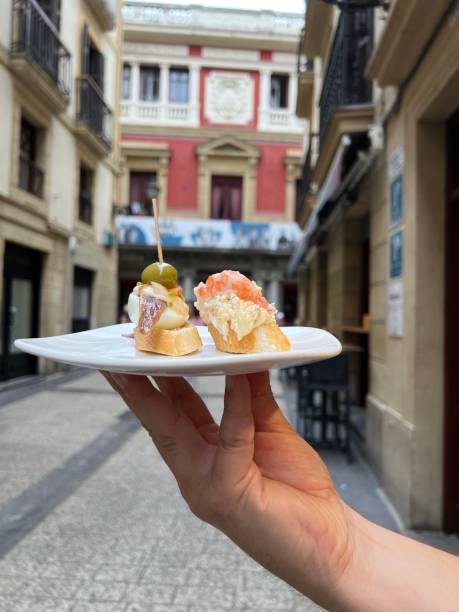 Serving pintxos in San Sebastian