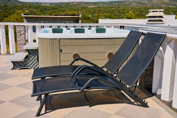 istock Rooftop Deck with Hot Tub and Lounge Chairs 2166441002