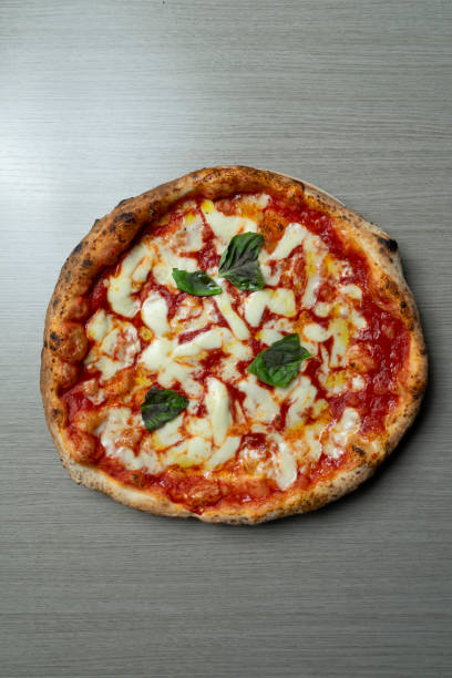 istock Margherita pizza with tomato, mozzarella from above 2166443827