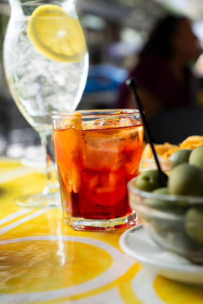 istock Negroni cocktails outdoors with appetizers 2166446547